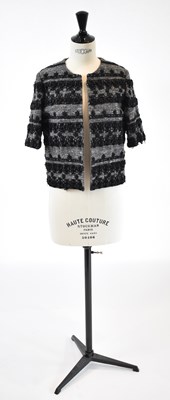 Lot 21 - CHLOE; a grey short sleeved cropped jacket...