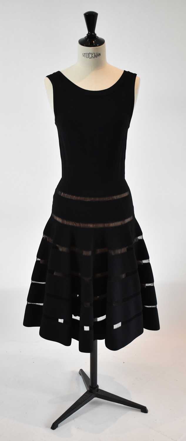 Lot 37 - ALAIA; a black 100% wool midi length evening...