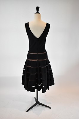 Lot 37 - ALAIA; a black 100% wool midi length evening...