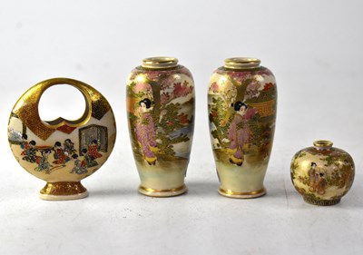 Lot 409 - A pair of Meiji period Satsuma baluster vases