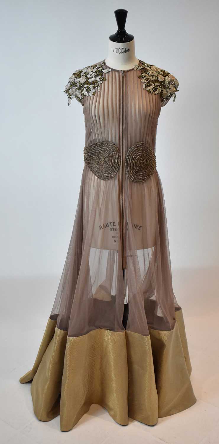 Lot 46 - RIDHI MEHRA; a nude silk and taffeta full...