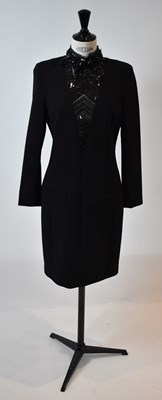 Lot 47 - EMILIO PUCCI; a black 100% wool cocktail dress...