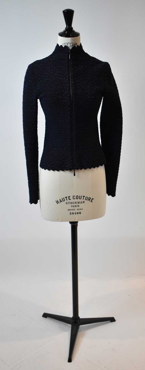 Lot 50 - ALAIA; a navy blue and black short length...