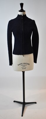 Lot 50 - ALAIA; a navy blue and black short length...