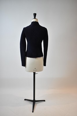 Lot 50 - ALAIA; a navy blue and black short length...