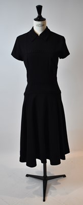 Lot 51 - YVES ST LAURENT; a black wool crepe short...