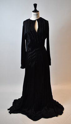 Lot 52 - A black 100% silk full length evening dreess,...