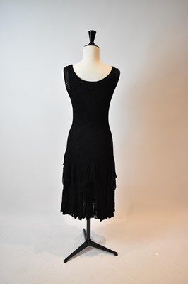 Lot 59 - ALEXANDER MCQUEEN; a black silk lace short...