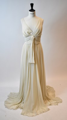 Lot 69 - ELIE SAAB; a cream 100% silk full length...