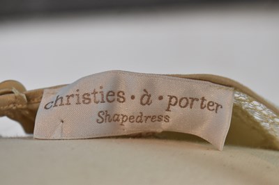 Lot 84 - CHRISTIES A PORTER; a beige 100% silk and...