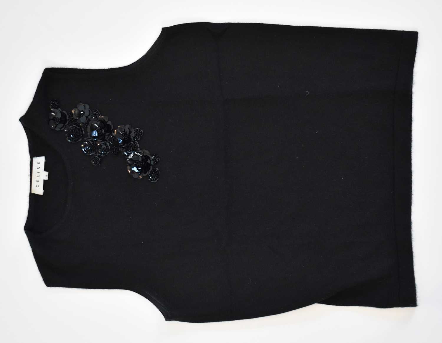 Lot 91 - CELINE; a black 100% wool tank top with...