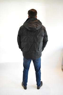 Lot 105 - LORO PIANA; a black Storm System rain and wind...