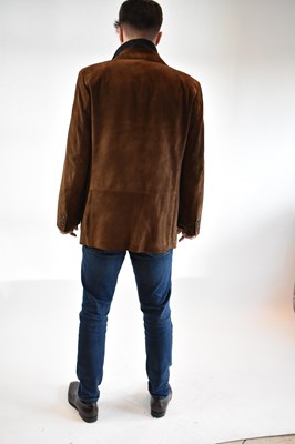 Lot 142 - ERMENEGILDO ZEGNA; a brown suede leather...