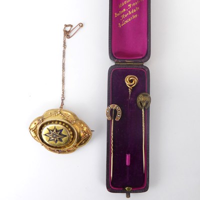 Lot 942 - Three 19th century gold-coloured tie pins