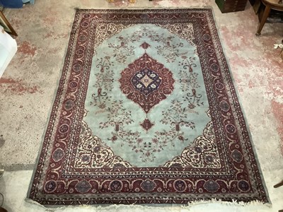 Lot 2280 - A red ground carpet. 410x291cm
