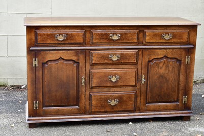 Lot 2362 - TITCHMARSH & GOODWIN; an oak dresser base with...