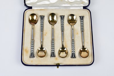 Lot 2788 - A case of six sterling silver and enamel...