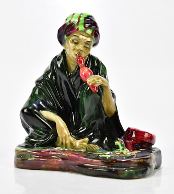 Lot 2208 - ROYAL DOULTON; HN1317, 'The Snake Charmer', a...
