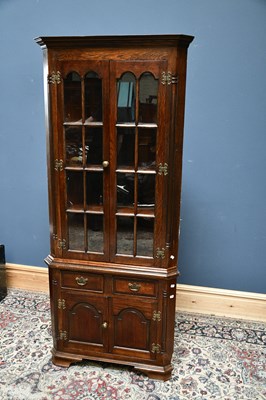 Lot 2648 - A reproduction oak freestanding corner...