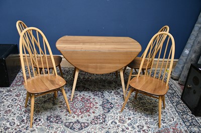 Lot 2599 - ERCOL; a light elm drop leaf table, 125cm,...