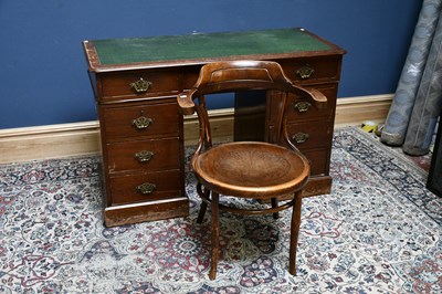 Lot 2506 - A late Victorian kneehole desk with an...