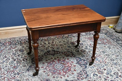 Lot 2387 - A Victorian fold over table on turned column...