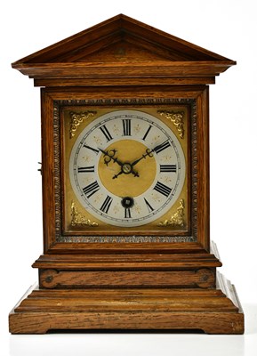 Lot 2308 - A late 19th/early 20th century oak mantel...