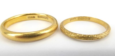 Lot 999 - Two 22ct gold band rings