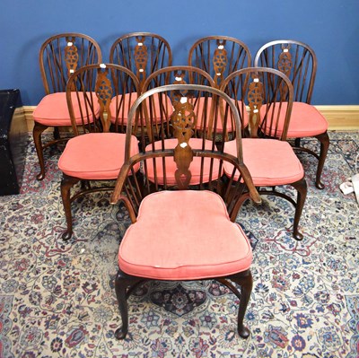 Lot 6502 - A set of eight elm seated Windsor dining...