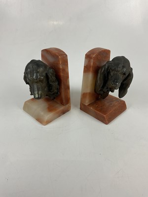 Lot 5164 - A pair of Art Deco spelter and alabaster...