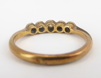 Lot 1019 - Two 18ct yellow gold rings