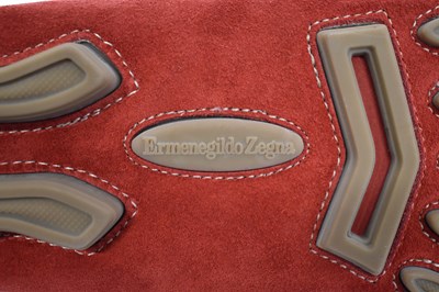 Lot 589 - TODS; a pair of red suede loafers, size 9.5,...