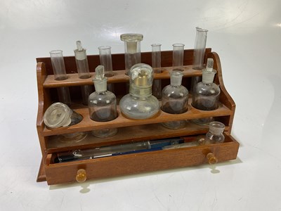 Lot 6352 - A test tube rack, together with test tubes and...