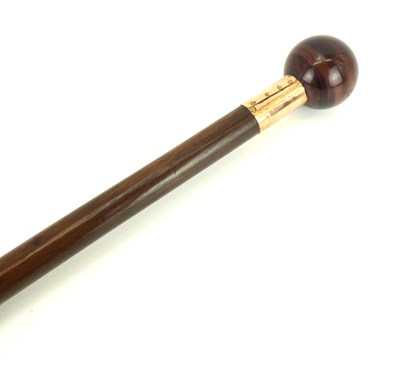 Lot 178 - A walking cane with agate ball handle