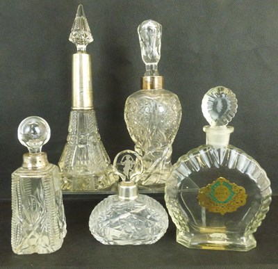 Lot 686 - Five early 20th century cut glass dressing table perfume decanters