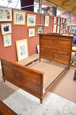 Lot 2628 - A mahogany floral carved bed, height 146cm,...