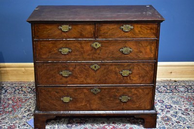 Lot 2435 - An 18th century walnut chest of two short over...