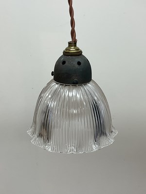 Lot 400 - A clear holophane wavy rim pendant light with...