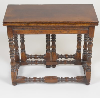 Lot 57 - A reproduction oak short gateleg coffee table...