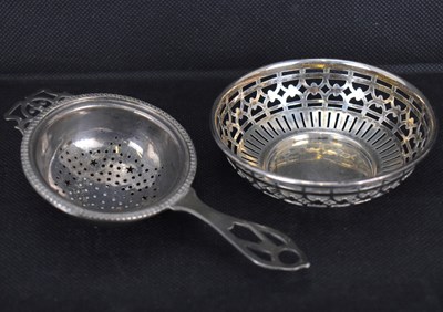 Lot 747 - An Elizabeth II hallmarked silver tea strainer,...