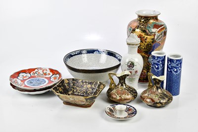 Lot 1213 - Two Japanese Imari plates with floral...