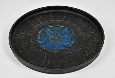 Lot 33 - TROIKA POTTERY; a circular wall charger with...