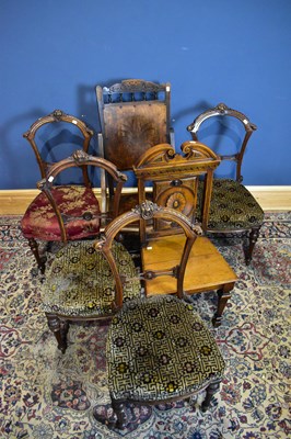 Lot 2559 - A set of four Victorian carved walnut dining...