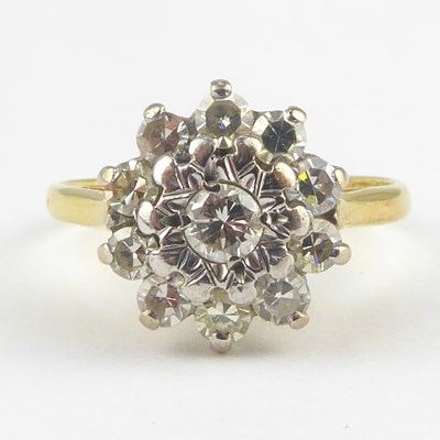 Lot 843 - An 18ct gold diamond cluster ring, size L,...