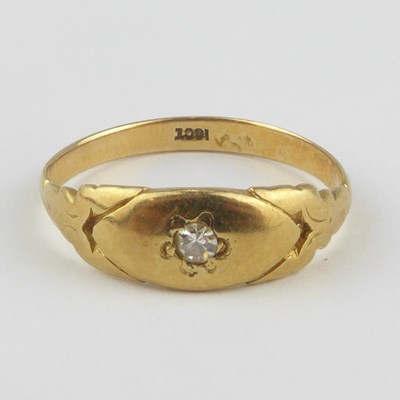 Lot 847 - An 18ct gold signet ring with star set tiny...