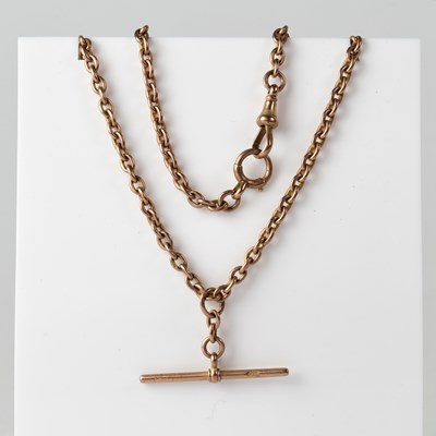 Lot 1053 - A 9ct gold watch chain with T-bar and lobster...