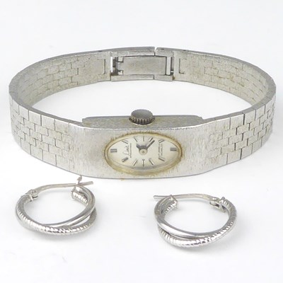 Lot 988 - A pair of 9ct white gold hoop earrings, height...