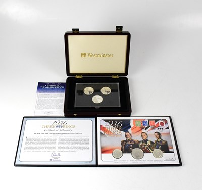 Lot 790 - A cased set of three silver coins,...