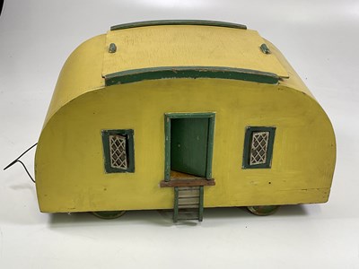 Lot 234 - ATTRIBUTED TO TRI-ANG; a cream and green 1950s...