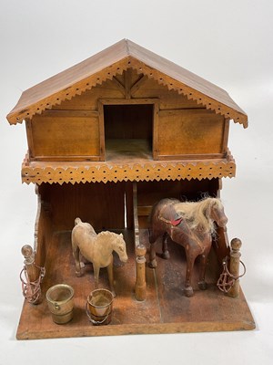 Lot 69 - A French Lenoble stable in varnished wood, the...